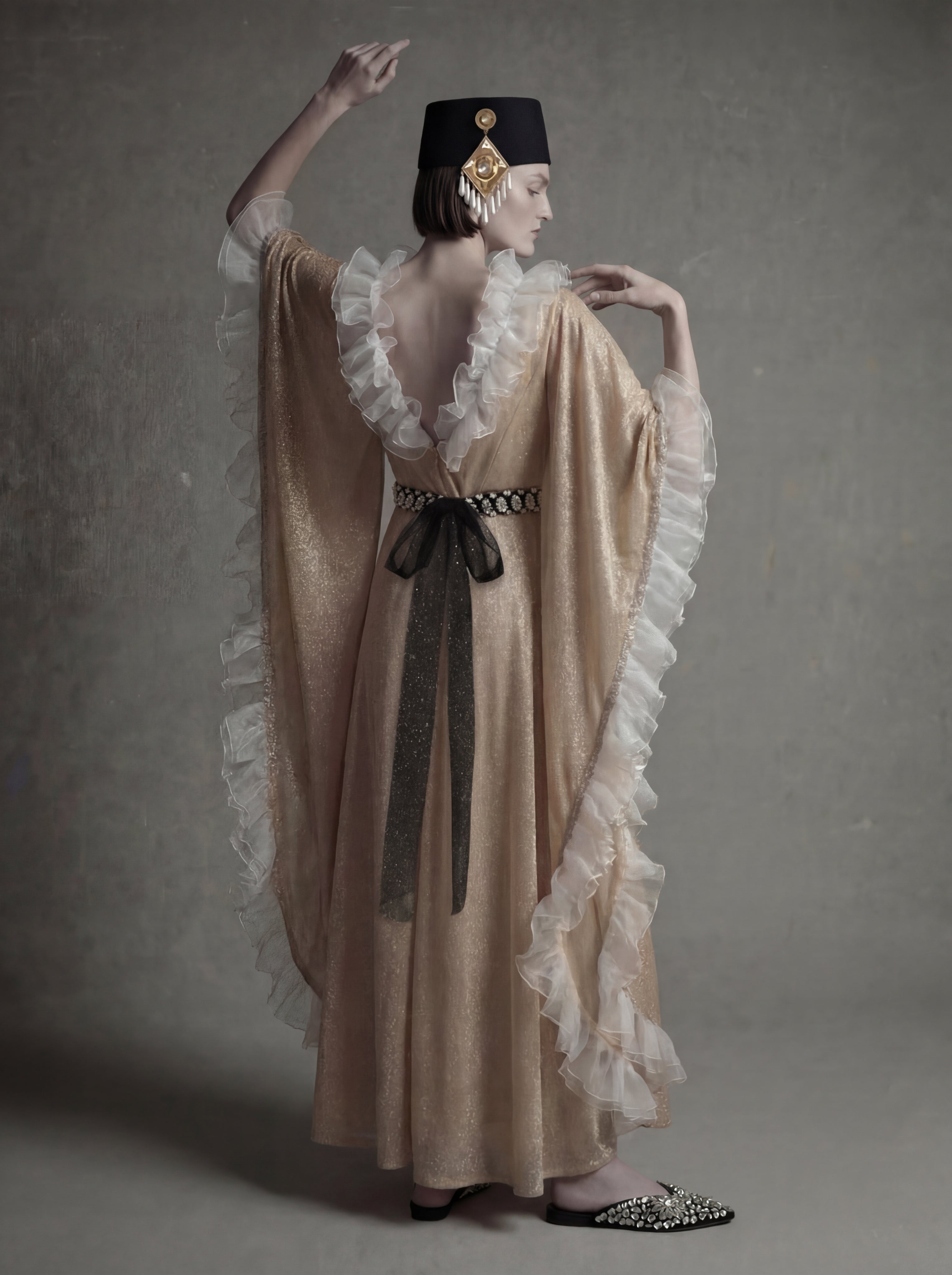 The Soul Detail– Sequin Ruffled Kaftan with Crystal Belt
A luminous Atelier Hekayat piece designed to capture light with effortless elegance.