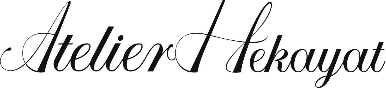 Logo of Atelier Hekayat with a decorative font.