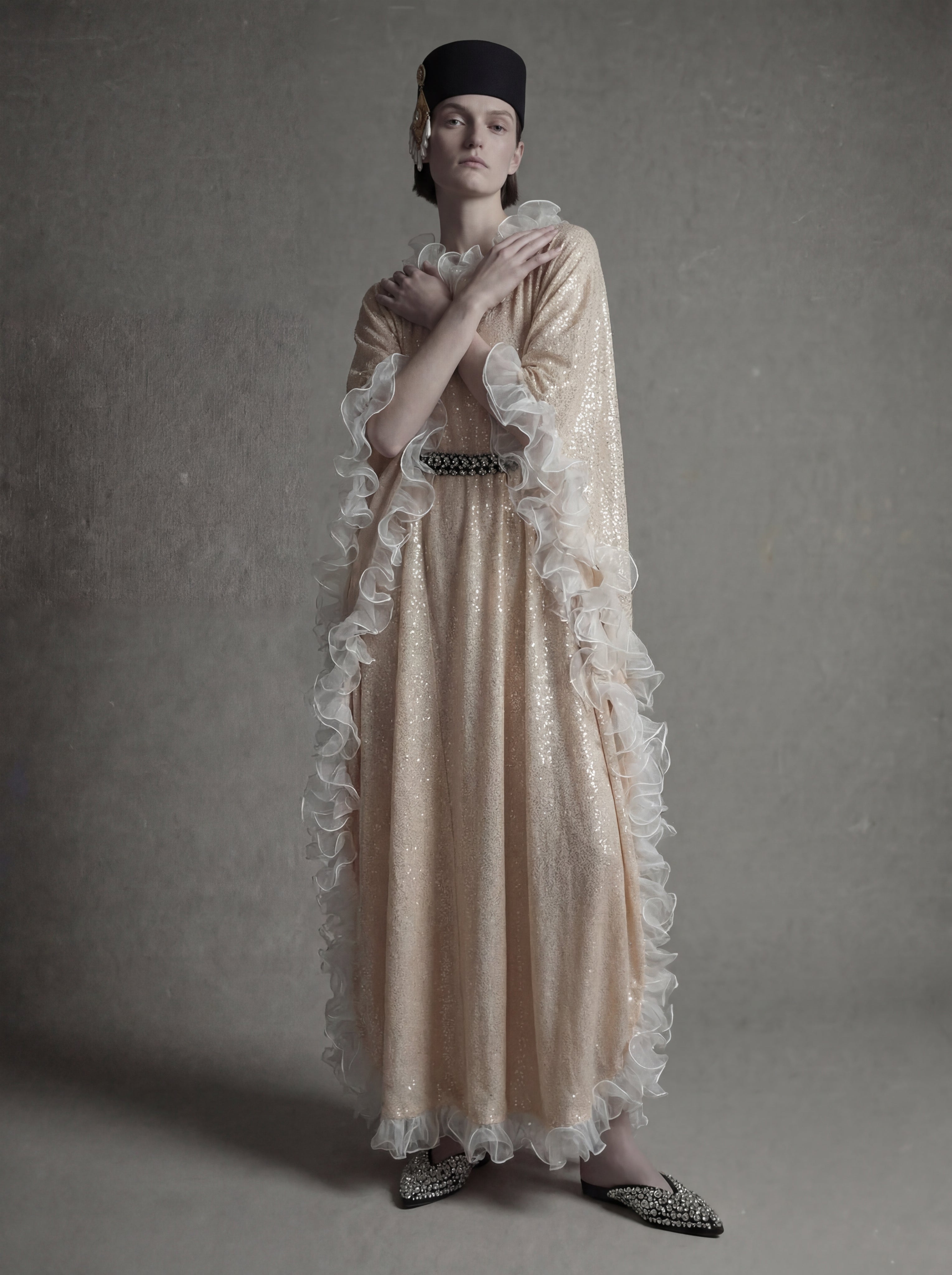 The Soul Detail– Sequin Ruffled Kaftan with Crystal Belt
A luminous Atelier Hekayat piece designed to capture light with effortless elegance.